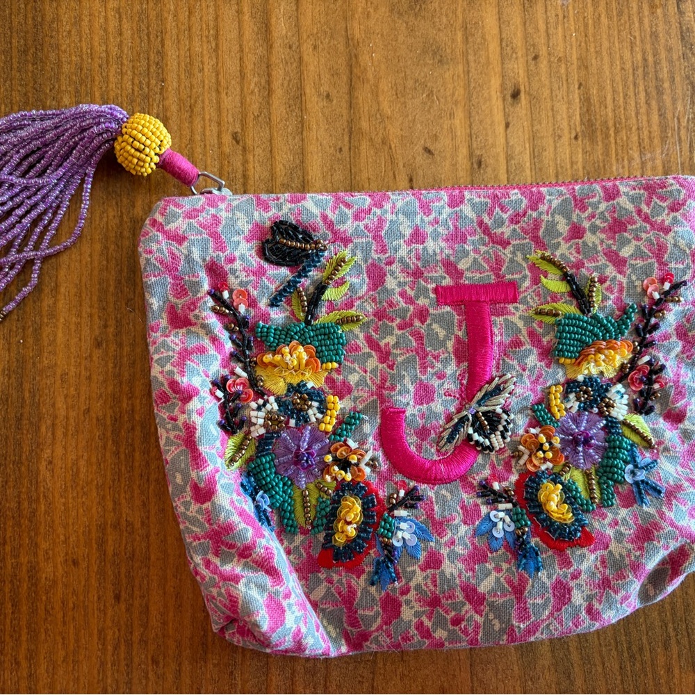 Anthropologie beaded clutch with beaded tassel and J